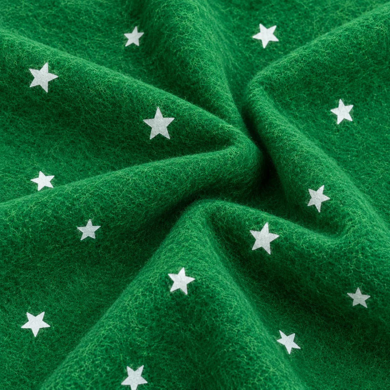 Groen vilt met mini witte sterretjes